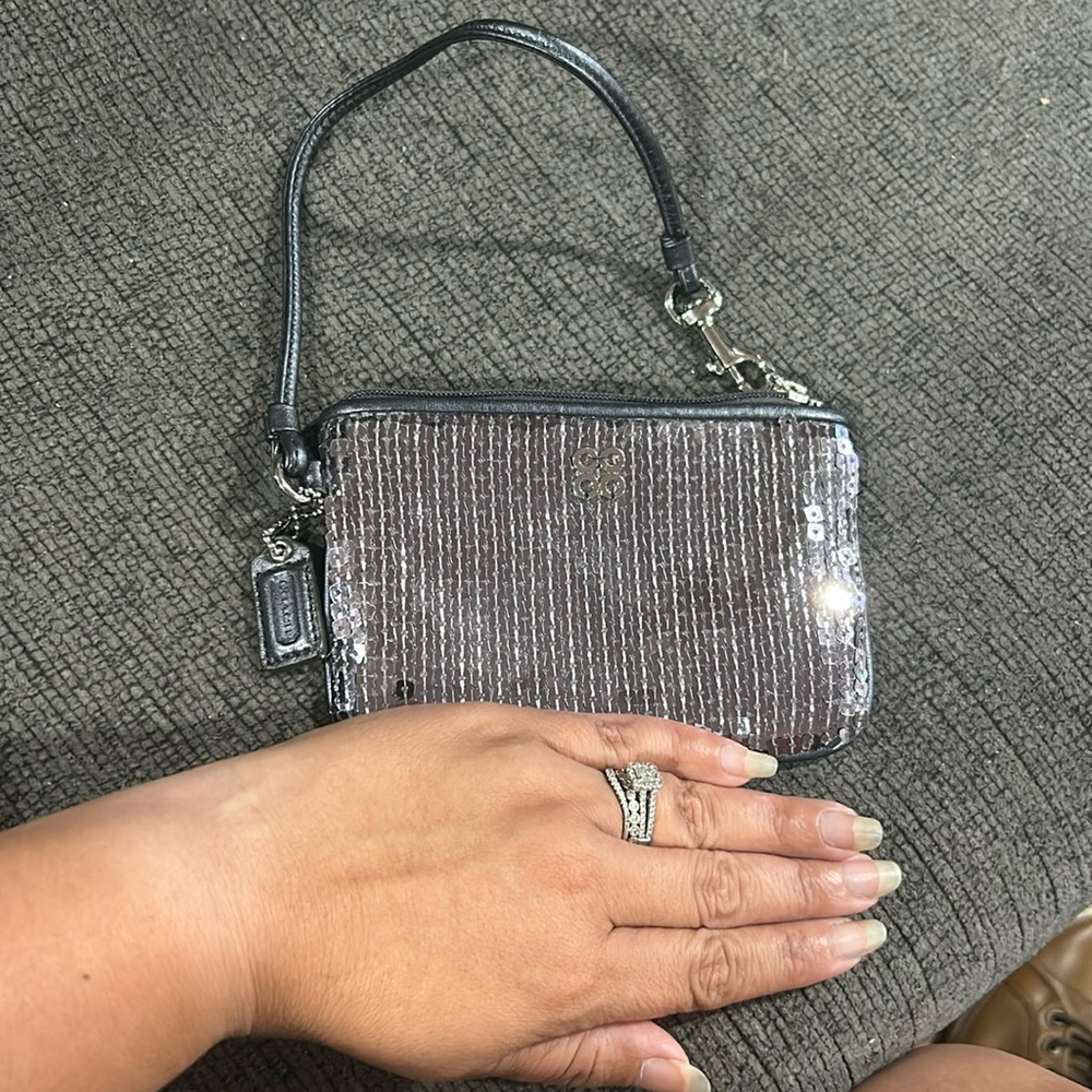 Coach Sequins silver wristlet